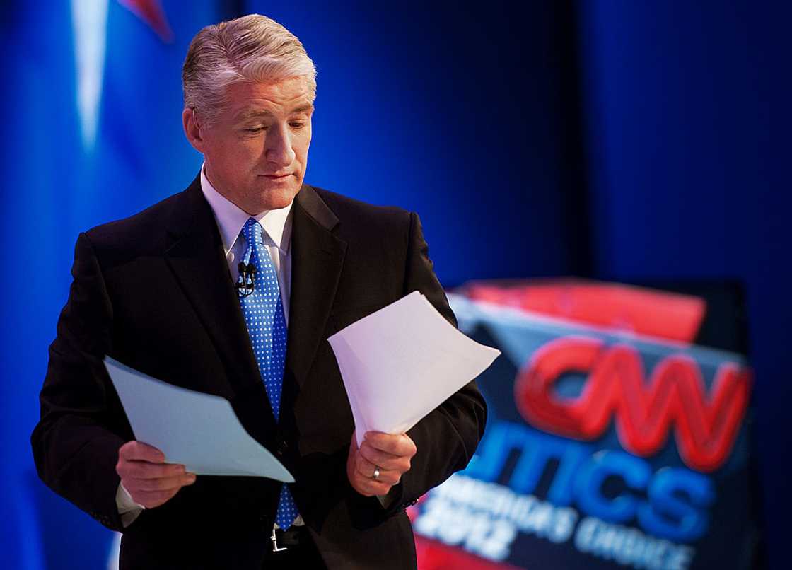 John King prepares to moderate a debate John King prepares to moderate a debate