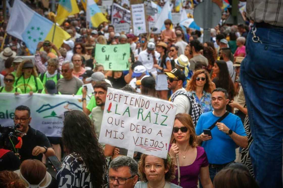Tens of thousands of demonstrators marched across Spain's Canary Islands in April to demand changes to the model of mass tourism, which they say is overwhelming the Atlantic archipelago Tens of thousands of demonstrators marched across Spain's Canary Islands in April to demand changes to the model of mass tourism, which they say is overwhelming the Atlantic archipelago