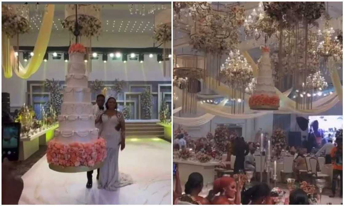 A couple was able to thrill the guests at their wedding when they cut a cake that stood on nothing. A couple was able to thrill the guests at their wedding when they cut a cake that stood on nothing.
