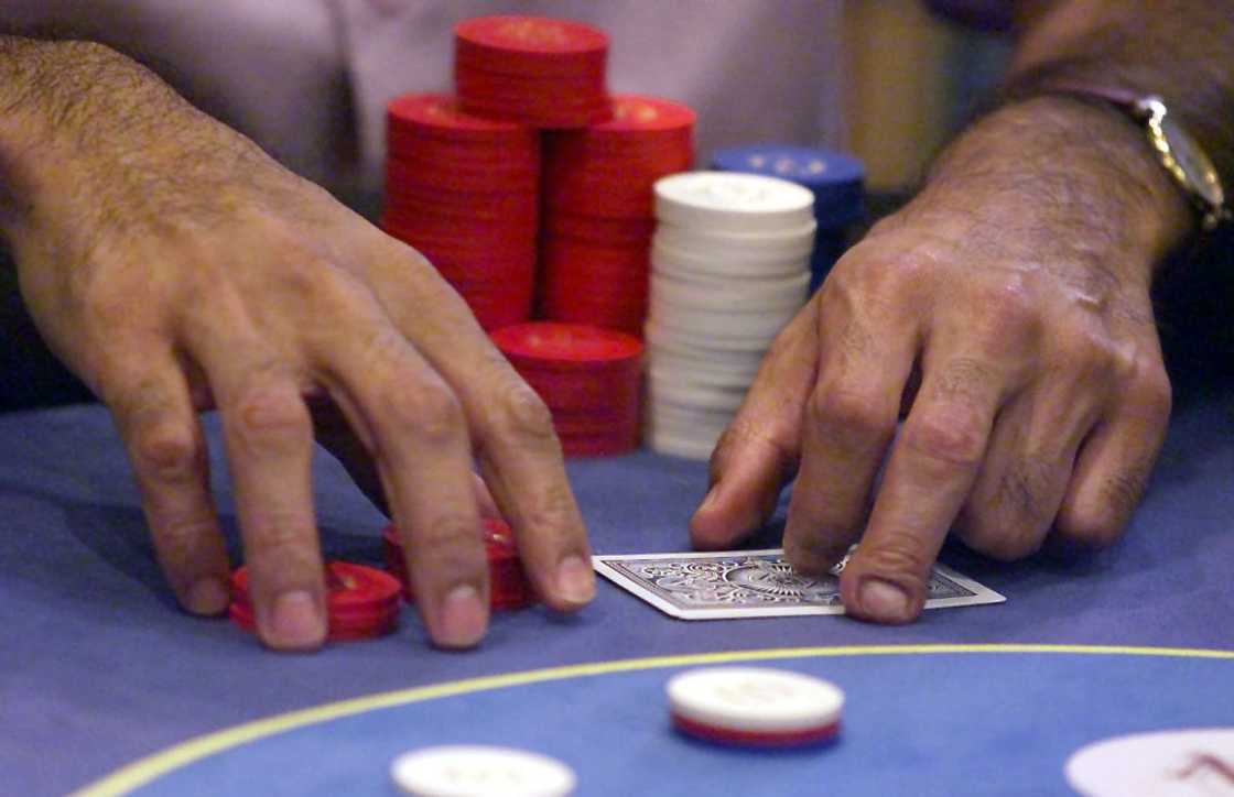Players prepare for a poker game Players prepare for a poker game