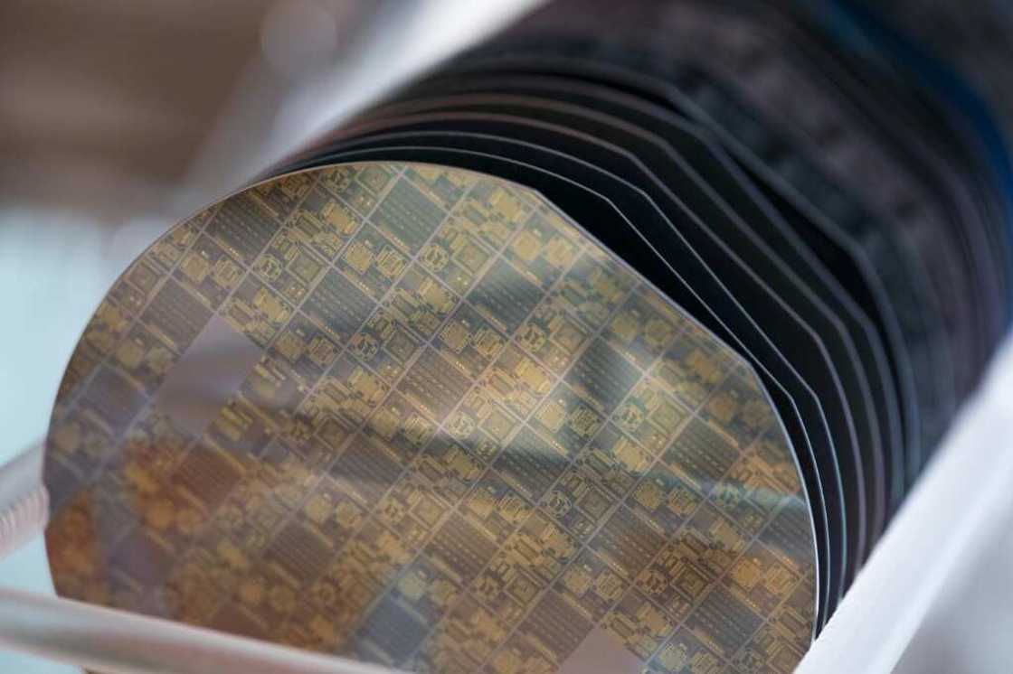 Computer chips are produced on circular 'wafers' of silicon Computer chips are produced on circular 'wafers' of silicon