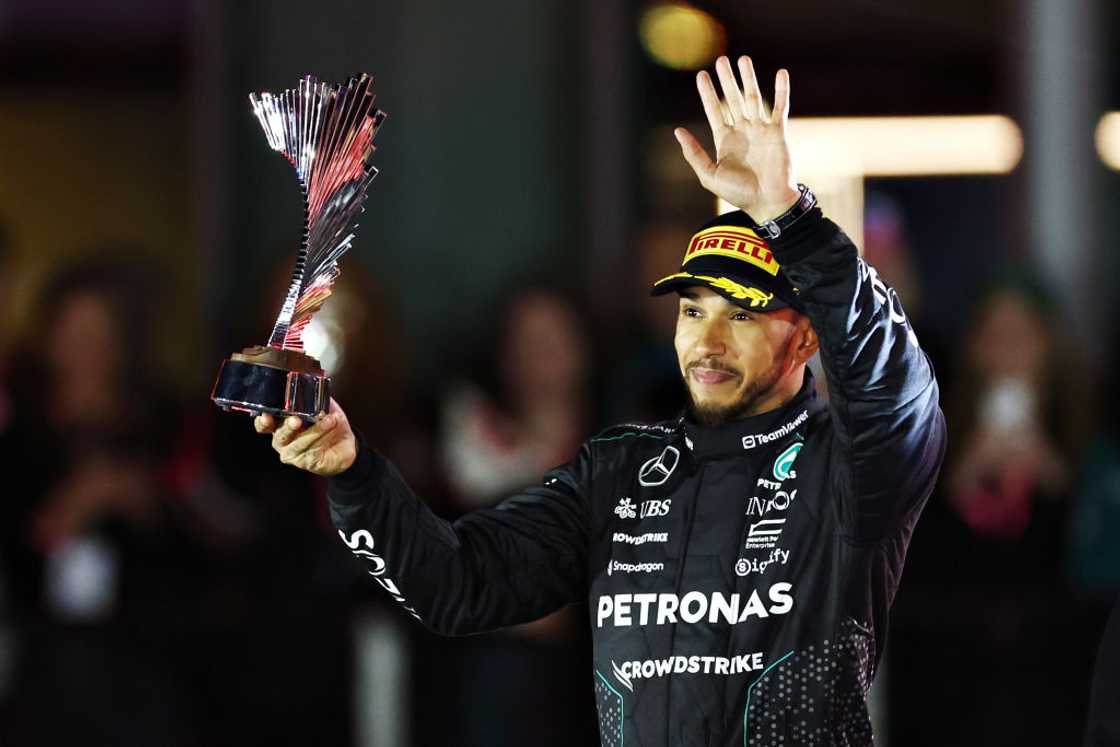 Lewis Hamilton celebrates on the podium Lewis Hamilton celebrates on the podium