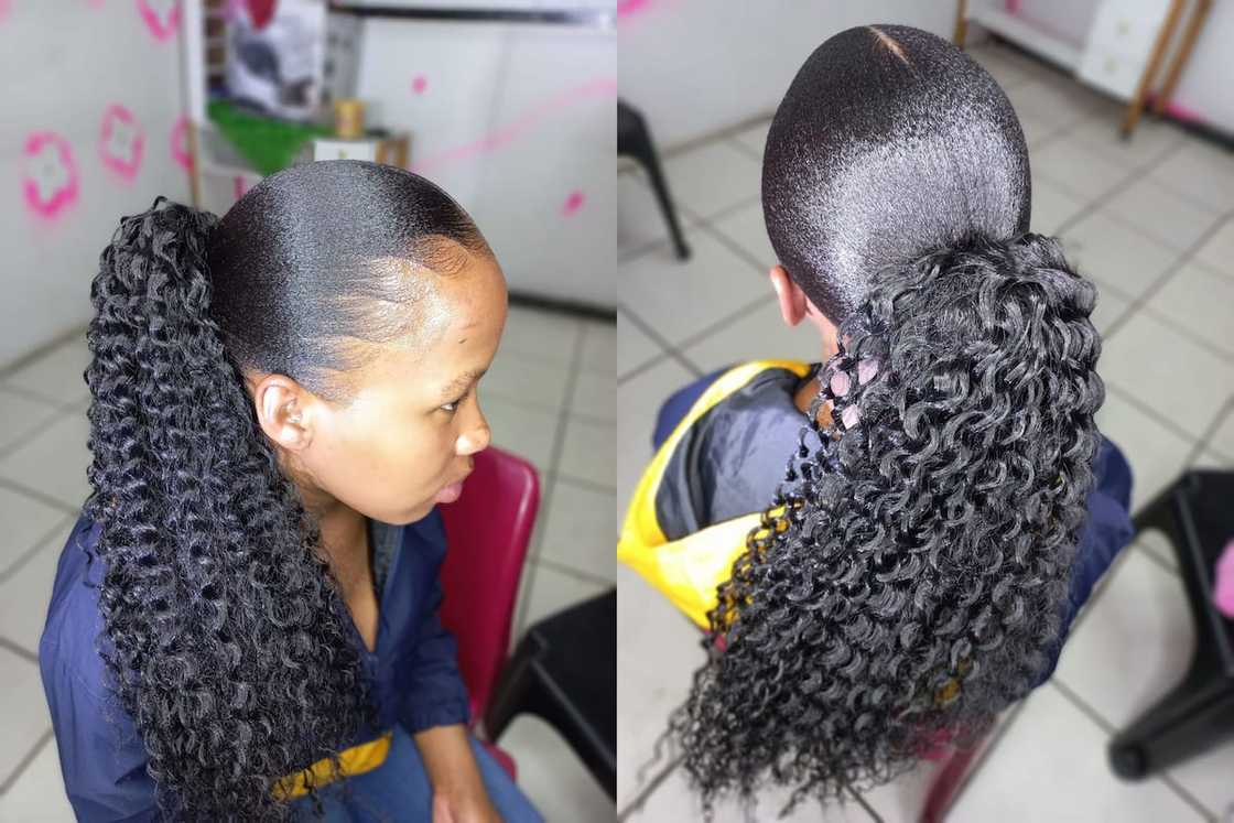 Natural hair with a low curly ponytail Natural hair with a low curly ponytail
