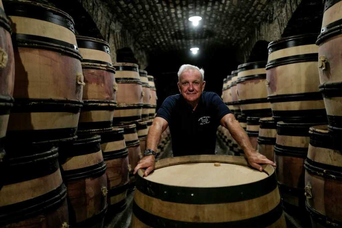 François Labet in the cellar of Château de La Tour in the Burgundy wine region François Labet in the cellar of Château de La Tour in the Burgundy wine region
