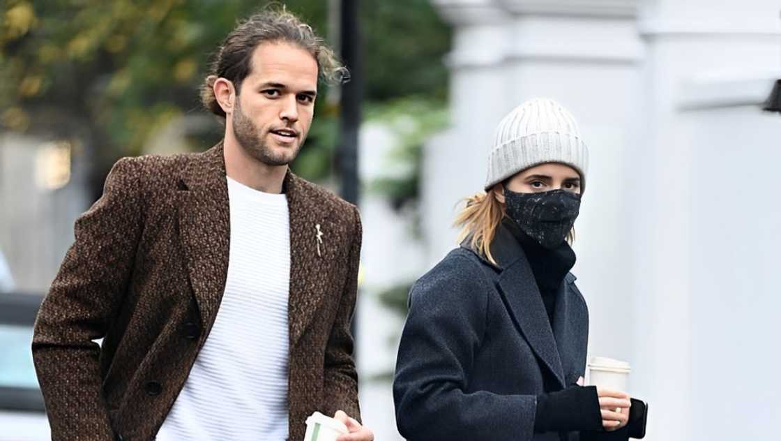 Emma Watson and Leo Robinton walk together after a coffee date in Primrose Hill. Emma Watson and Leo Robinton walk together after a coffee date in Primrose Hill.