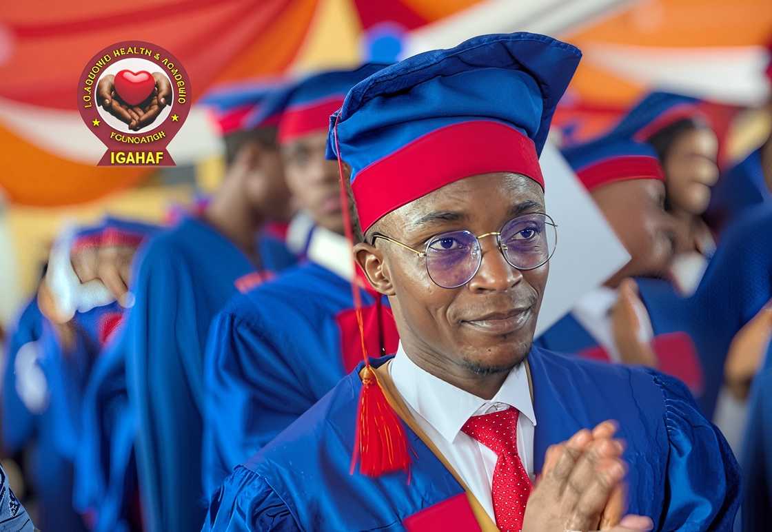 A IG Aguowo Health and Academic Foundation scholarship beneficiary in a blue graduation cap and gown during a ceremony. A IG Aguowo Health and Academic Foundation scholarship beneficiary in a blue graduation cap and gown during a ceremony.