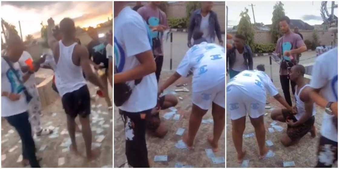Reactions as man's friends spray lady N50 notes for saying yes to his proposal Reactions as man's friends spray lady N50 notes for saying yes to his proposal