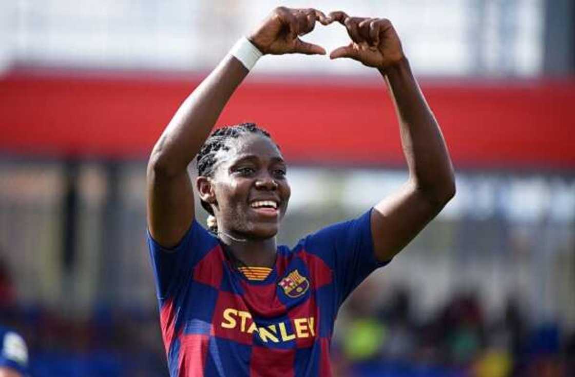 Asisat Oshoala, Super Falcons' striker, shows off new orange hairstyle