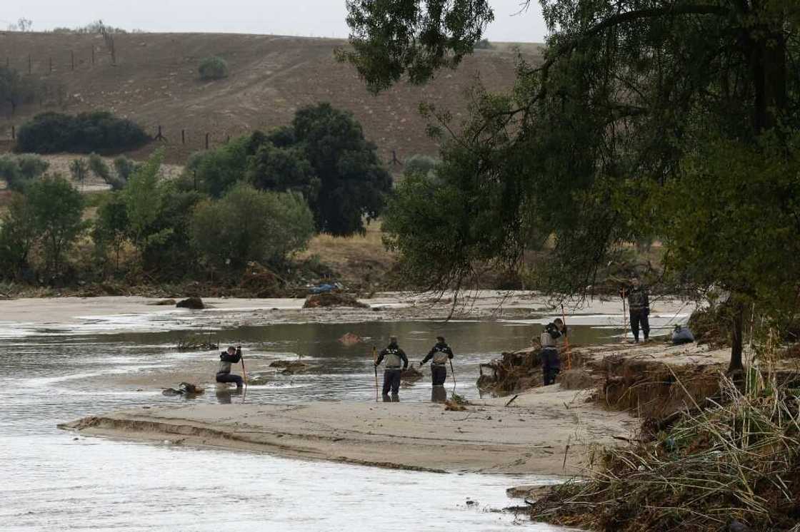 Police search a river in the town of Aldea del Fresno near Madrid Police search a river in the town of Aldea del Fresno near Madrid