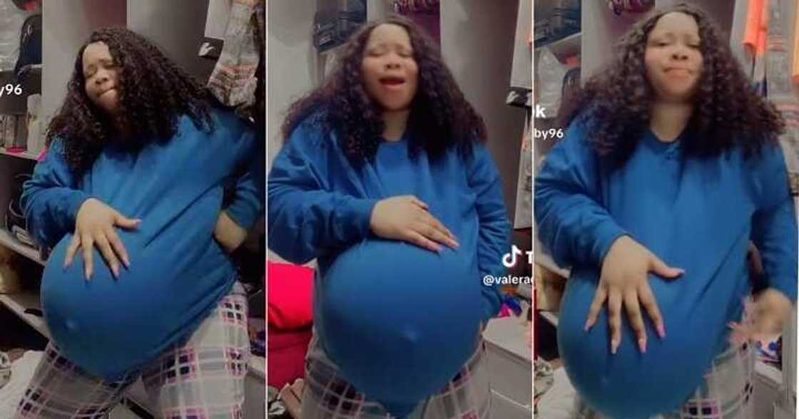 Nigerian woman pregnant with triplets flaunts baby bump Nigerian woman pregnant with triplets flaunts baby bump