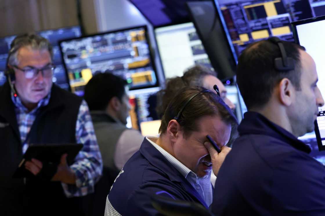 Traders had a tough day Thursday on the floor of the New York Stock Exchange (NYSE) Traders had a tough day Thursday on the floor of the New York Stock Exchange (NYSE)