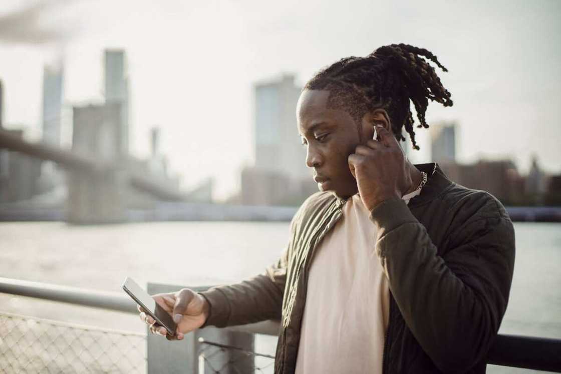 A man using a phone A man using a phone