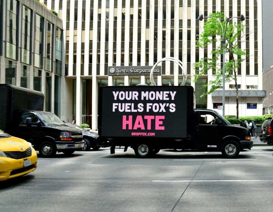 Mobile billboards circle Fox headquarters in May 2023 with a message aimed at advertisers not to fund Fox News