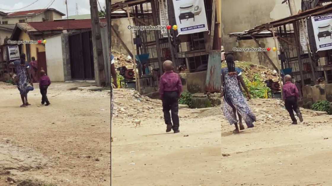 Young boy struts confidently on graduation outfit