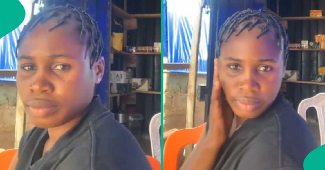 Lady excited as she flaunts her new provision shop. Lady excited as she flaunts her new provision shop.