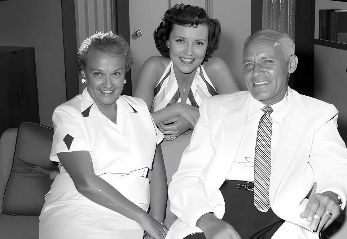 Betty White (C) pictured with her parents, Tess Curtis White and her father