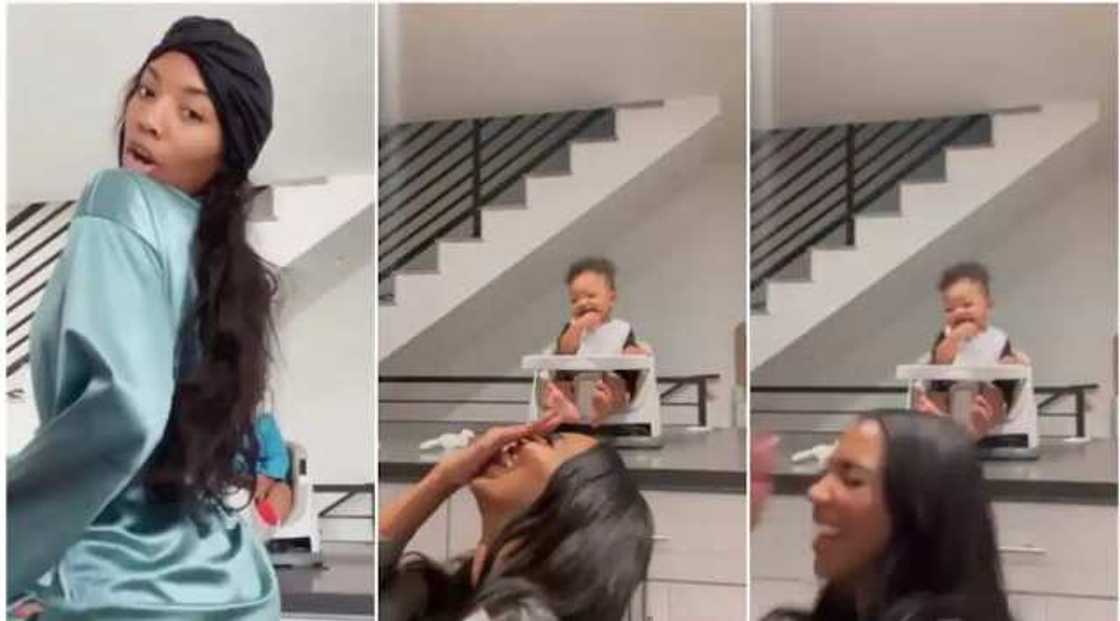 The little kid laughed at her mum who tried twerking. The little kid laughed at her mum who tried twerking.