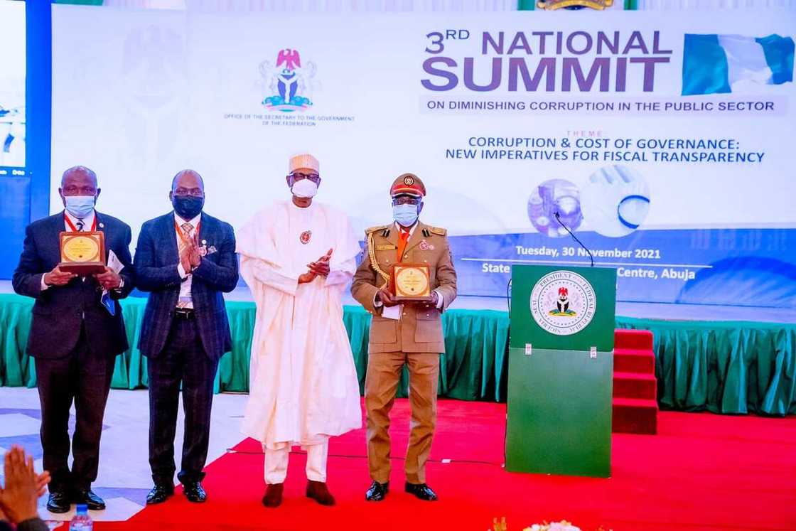 Buhari Honours 3 Nigerians for Integrity, Vows to Sanction Corrupt Public Servants Buhari Honours 3 Nigerians for Integrity, Vows to Sanction Corrupt Public Servants
