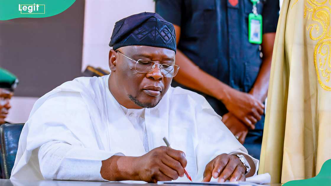 Dr. Joshua T. Kwanam, executive secretary of the Adamawa State Scholarship Board, signing documents Dr. Joshua T. Kwanam, executive secretary of the Adamawa State Scholarship Board, signing documents