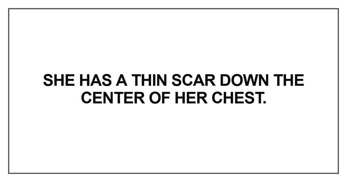 She has a thin scar down She has a thin scar down