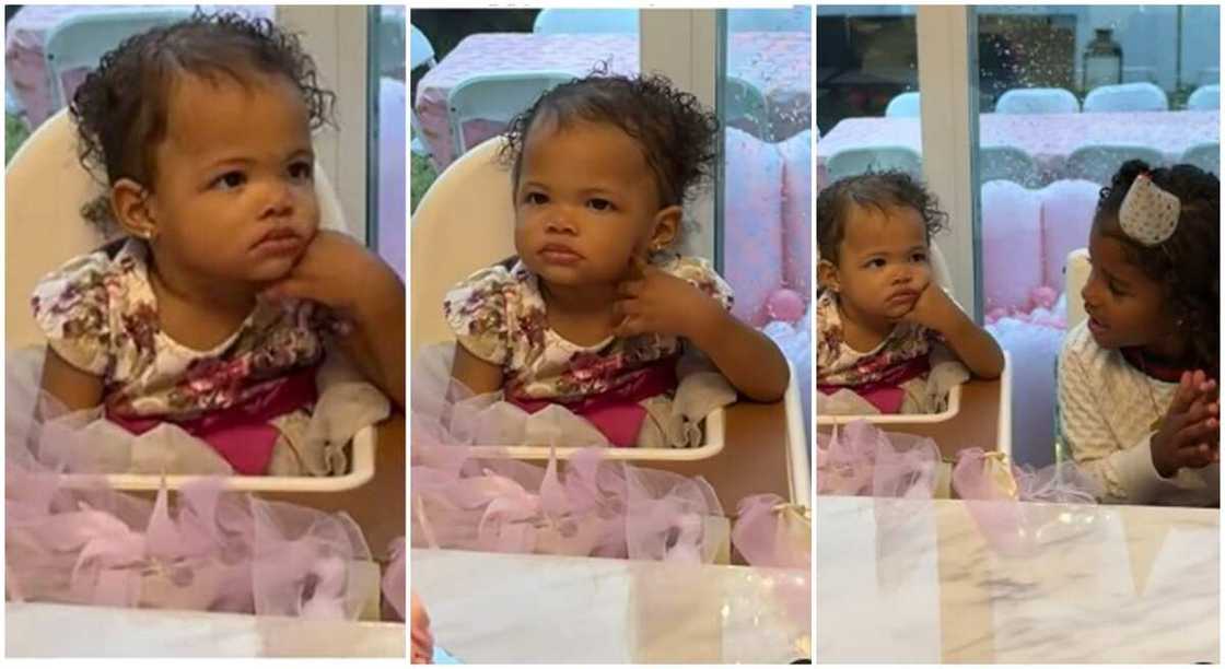 Baby girl named Amira keeps straight face as her birthday song is being rendered in video. Baby girl named Amira keeps straight face as her birthday song is being rendered in video.