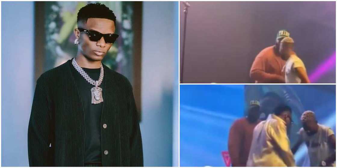 Wizkid stops bouncer from chasing die-hard fan from the stage Wizkid stops bouncer from chasing die-hard fan from the stage