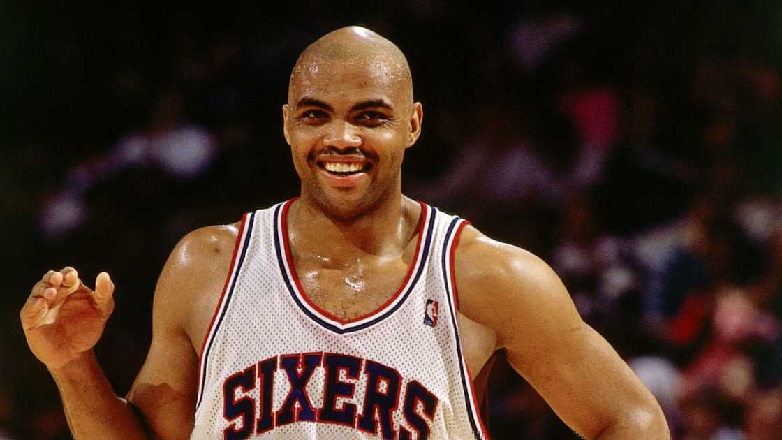 Charles Barkley of the Philadelphia 76ers smiles during an NBA game.