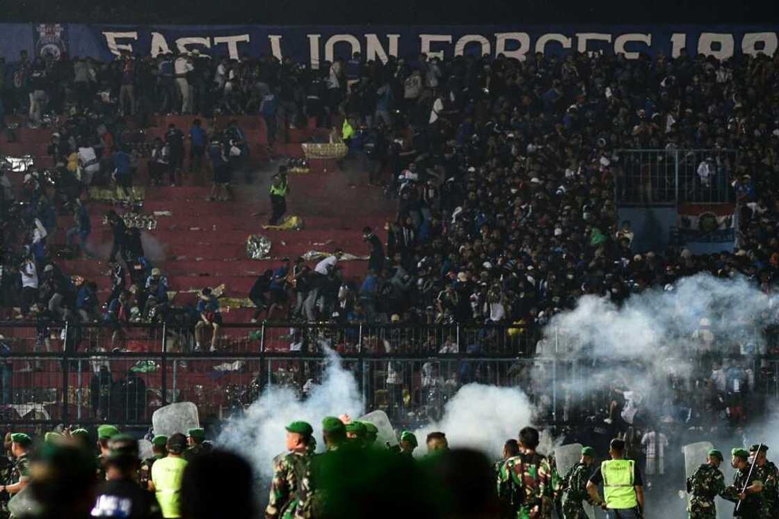 Police fired tear gas into packed stands Police fired tear gas into packed stands