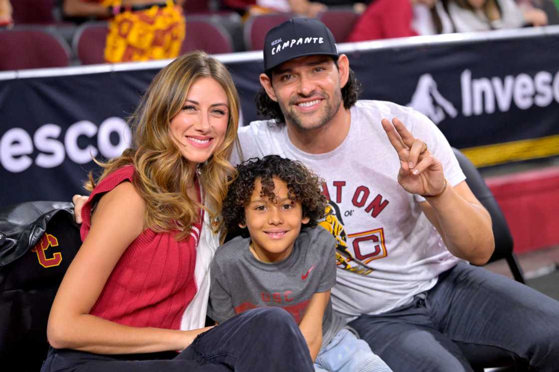 Perry Mattfeld, Mark Sanchez, and his son, Daniel, attends a football match in Los Angeles, California Perry Mattfeld, Mark Sanchez, and his son, Daniel, attends a football match in Los Angeles, California