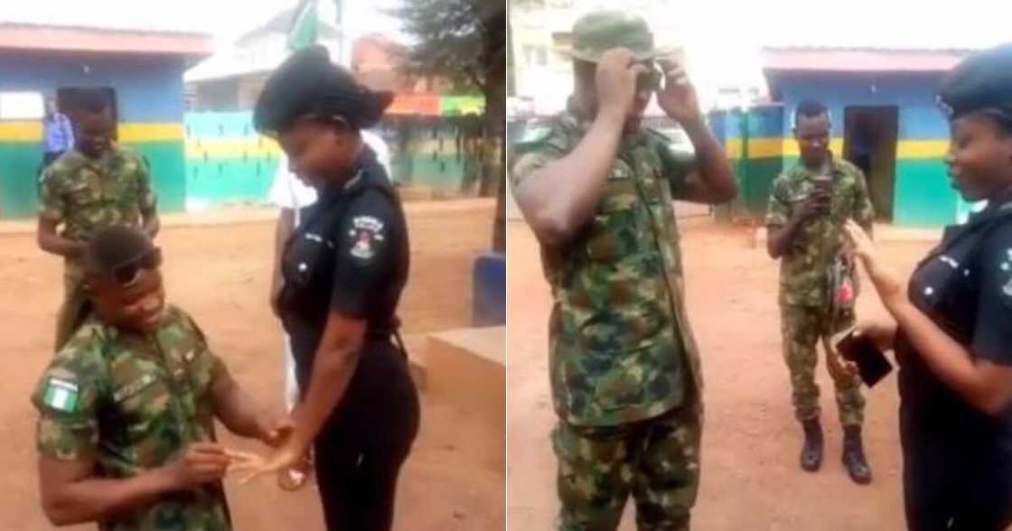 Hearts melt as Nigerian soldier publicly proposes to beautiful police woman (video) Hearts melt as Nigerian soldier publicly proposes to beautiful police woman (video)