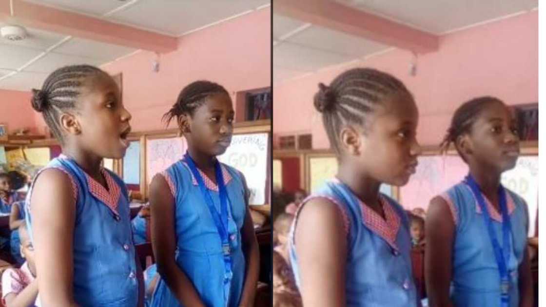 Female students gives impressive pronunciation of some vowels Female students gives impressive pronunciation of some vowels