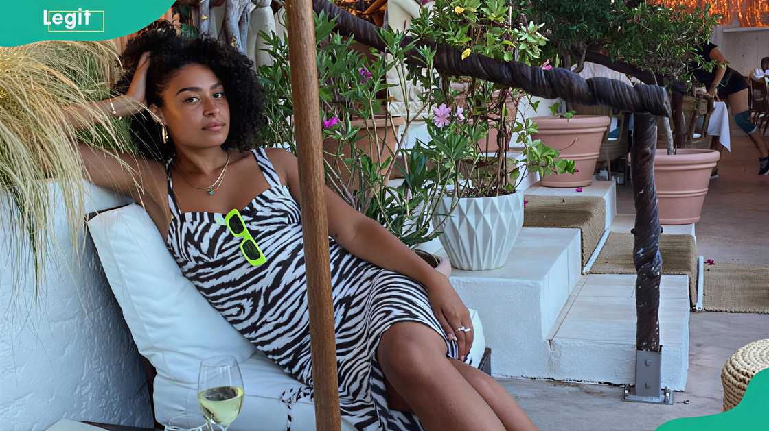 Ella Kenny unwinding outside a hotel