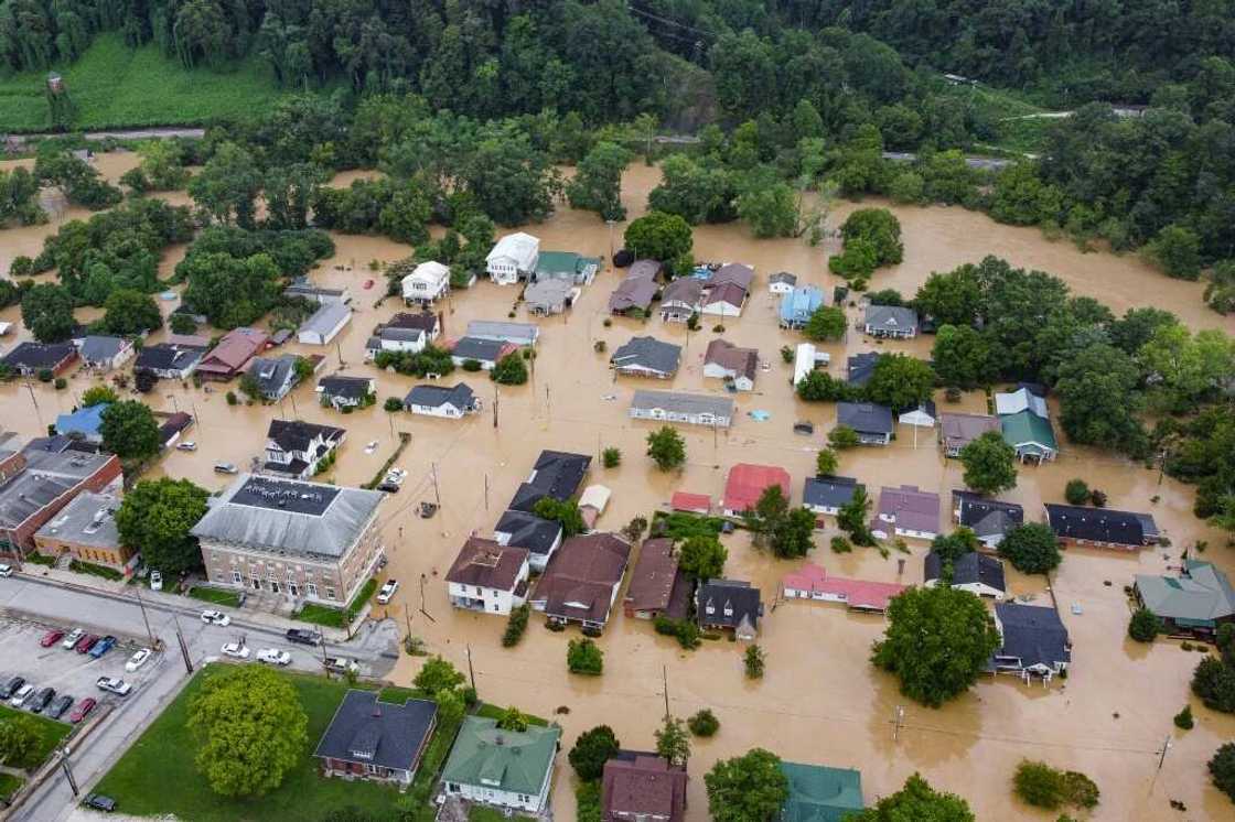 Aerial view of homes submerged under flood waters from the North Fork of the Kentucky River in Jackson, Kentucky Aerial view of homes submerged under flood waters from the North Fork of the Kentucky River in Jackson, Kentucky