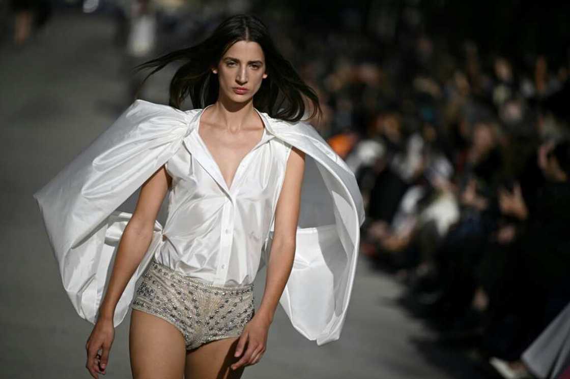 A model presents a creation by British designer Stella McCartney during her Paris Fashion Week show A model presents a creation by British designer Stella McCartney during her Paris Fashion Week show