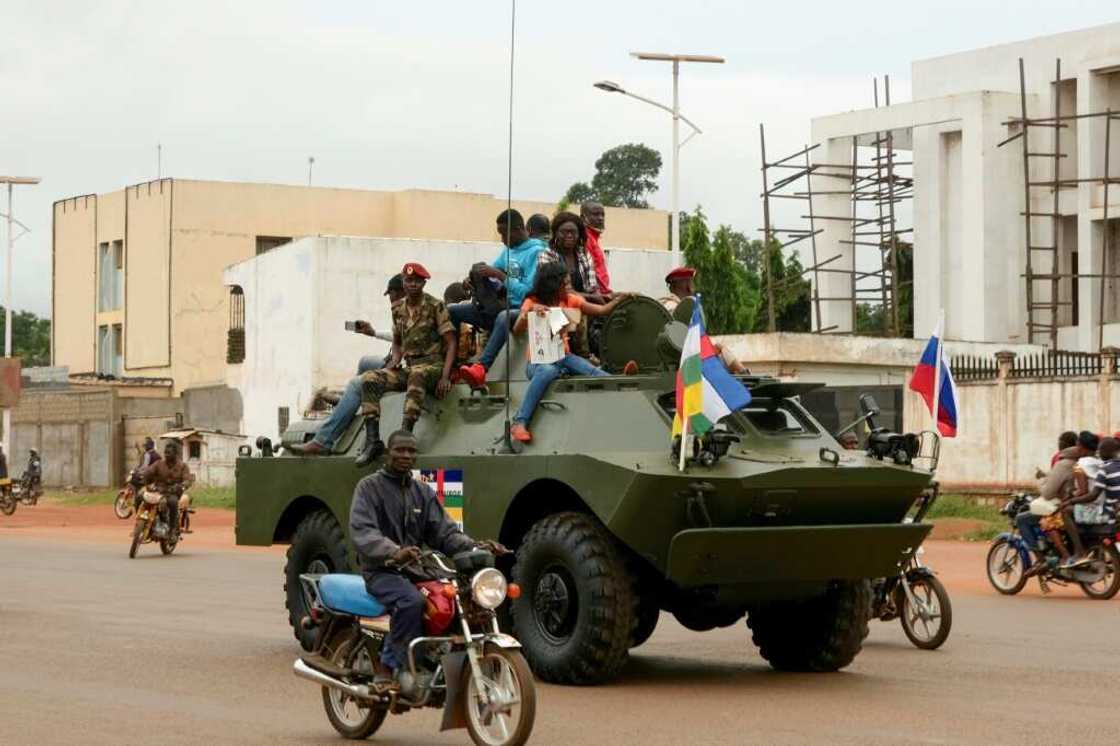 A Russian armoured personnel carrier, decorated with Russian and CAR flags, in the streets of Bangui in October 2020 A Russian armoured personnel carrier, decorated with Russian and CAR flags, in the streets of Bangui in October 2020