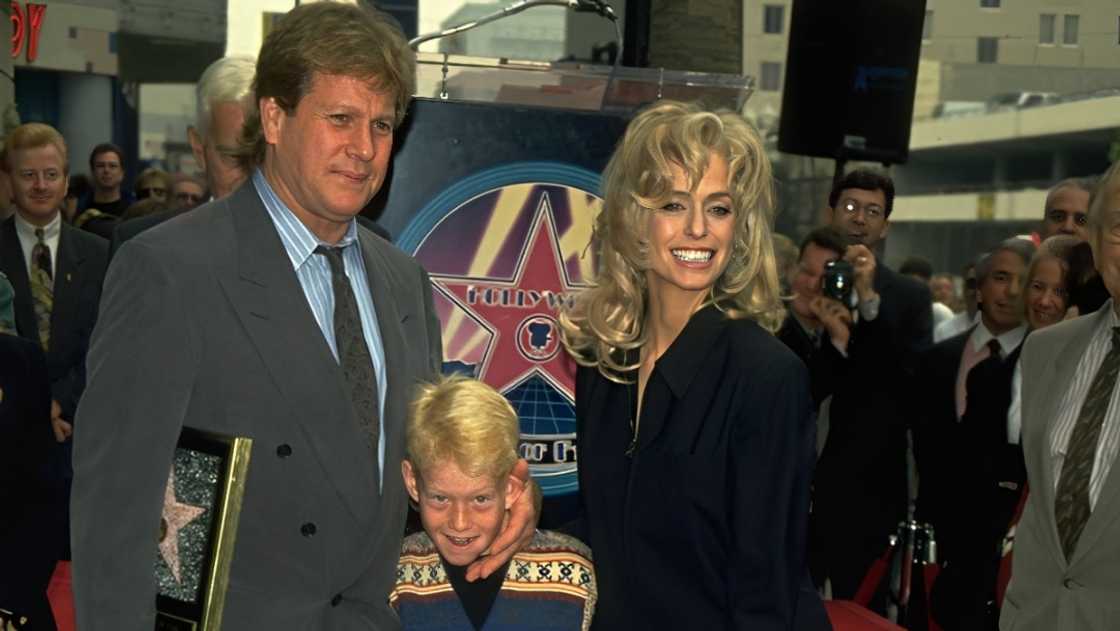 Ryan O'Neal (L), Redmond Oneal (C) and Farrah Fawcett (L) pose as a family on Hollywood Boulevard where Fawcett received her star. Ryan O'Neal (L), Redmond Oneal (C) and Farrah Fawcett (L) pose as a family on Hollywood Boulevard where Fawcett received her star.