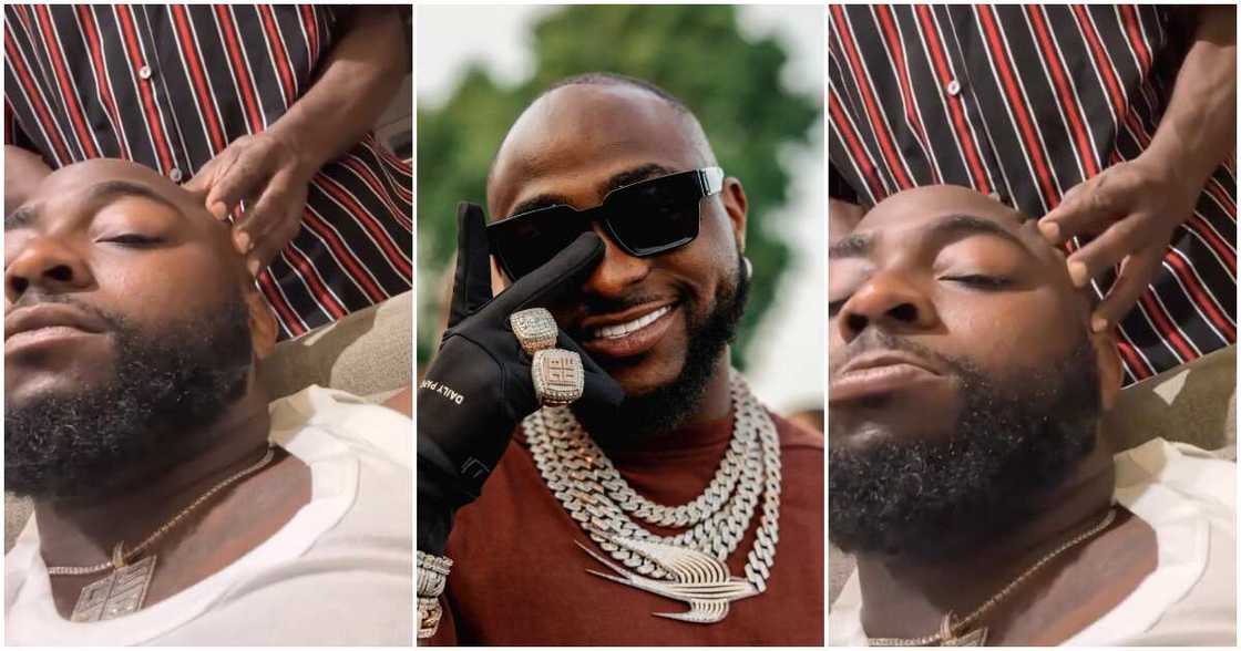 Davido getting massage. Davido getting massage.