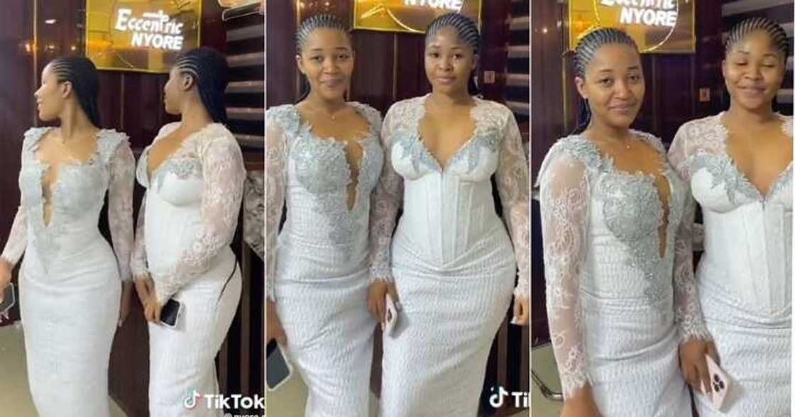 Pretty lady shows off look-alike friend Pretty lady shows off look-alike friend