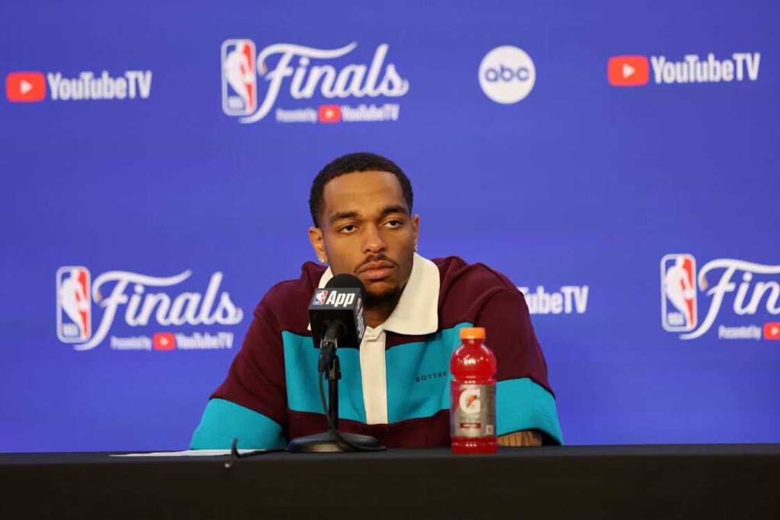 NBA player P.J. Washington at a press conference NBA player P.J. Washington at a press conference