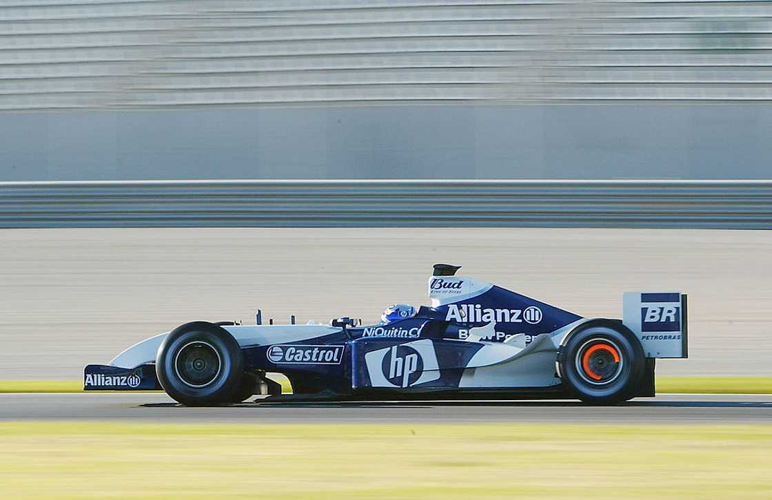 Juan Pablo Montoya of Columbia drives the new BMW Williams FW26 for the first time