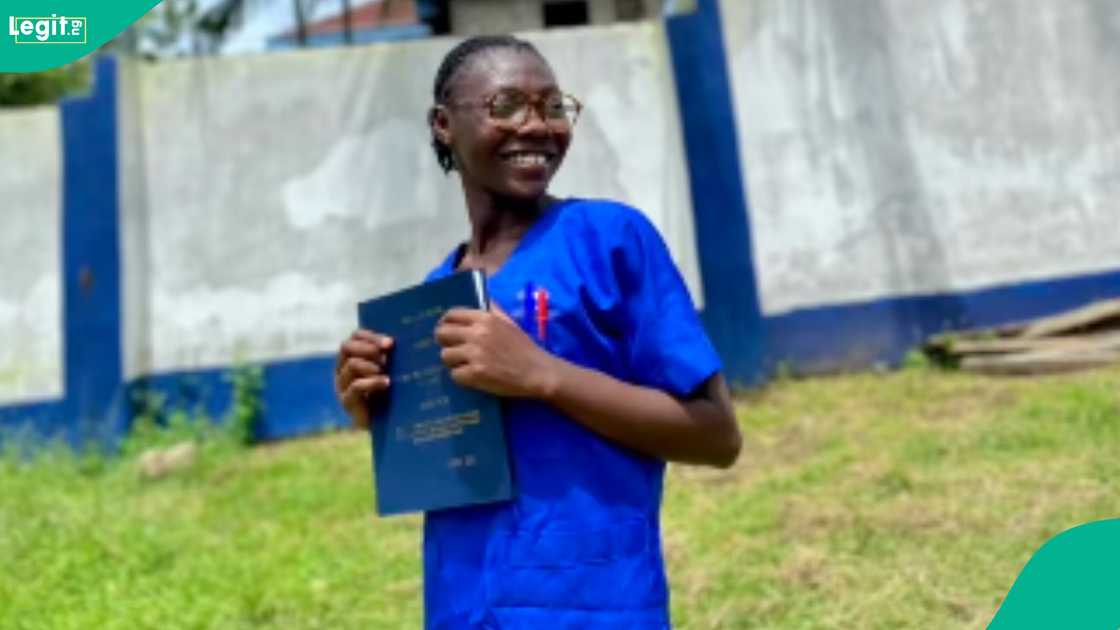 A Nigerian lady celebrates as she becomes a registered nurse