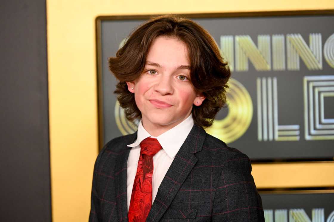 Winslow Fegley at the premiere of "Spinning Gold"