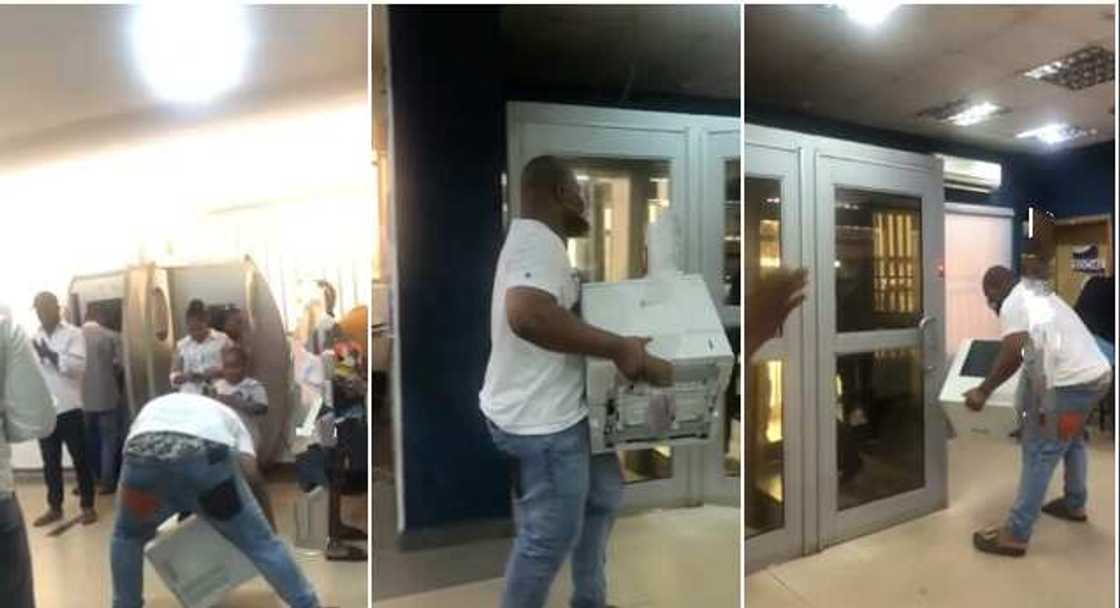 Nigerian man seizes printing machine in commercial bank, demands to be attended to Nigerian man seizes printing machine in commercial bank, demands to be attended to