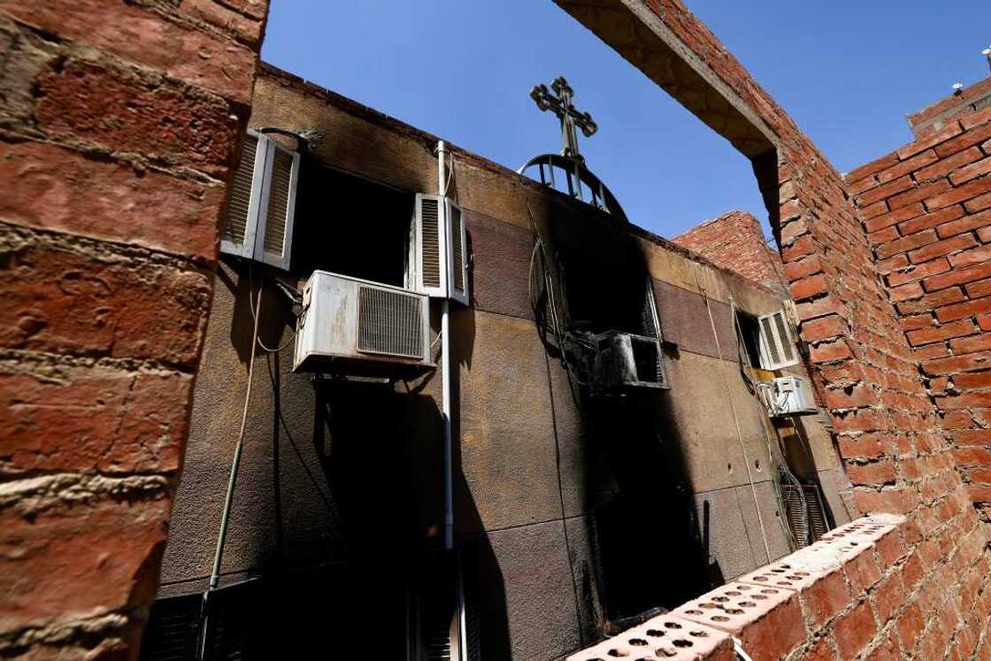 The charred Abu Sifin church located in the densely populated Imbaba neighbourhood west of the Nile river The charred Abu Sifin church located in the densely populated Imbaba neighbourhood west of the Nile river