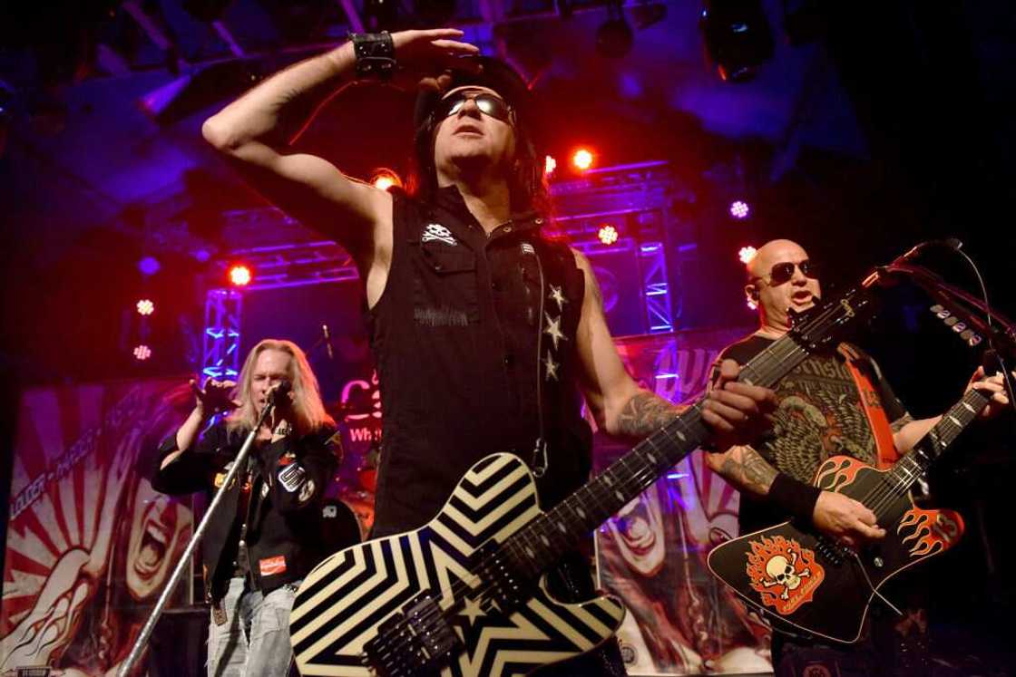 Musicians Robert Mason, Erik Turner and Joey Allen of Warrant perform during Frontiers Rock Holiday Bash at The Canyon Club Musicians Robert Mason, Erik Turner and Joey Allen of Warrant perform during Frontiers Rock Holiday Bash at The Canyon Club