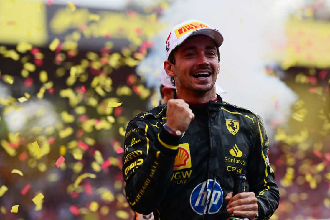 Charles Leclerc and Ferrari celebrate on the podium during the F1 Grand Prix of Italy Charles Leclerc and Ferrari celebrate on the podium during the F1 Grand Prix of Italy
