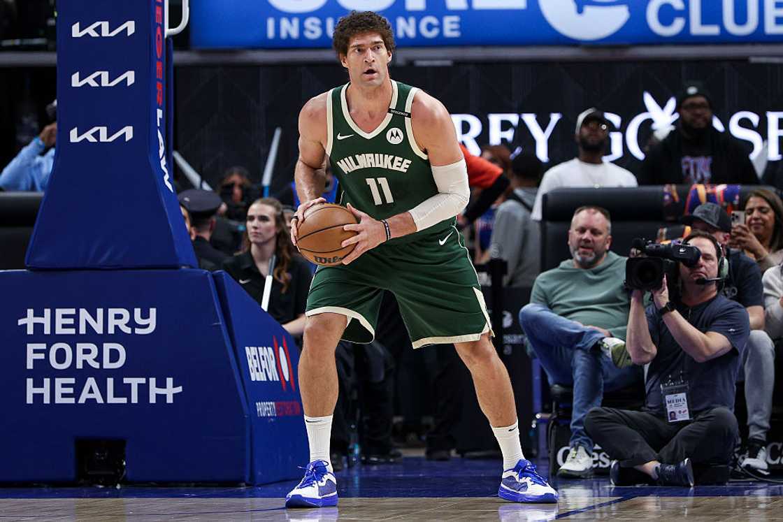 Brook Lopez looks to pass the ball at Little Caesars Arena Brook Lopez looks to pass the ball at Little Caesars Arena