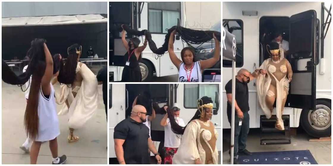 Social media uses react as singer Lizzo steps out in 43 inches long braids that had to be held up by 4 persons as she walked Social media uses react as singer Lizzo steps out in 43 inches long braids that had to be held up by 4 persons as she walked