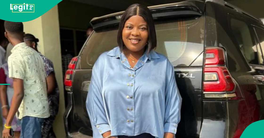 Nigerian mother dances with her albino children. Nigerian mother dances with her albino children.