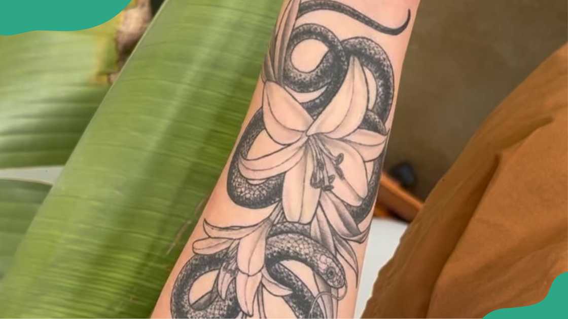 Lily of the Valley and snake tattoo Lily of the Valley and snake tattoo